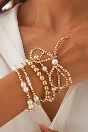 Multi-Layer Bow and Pearl Bracelet